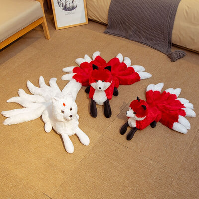 peluches renard rouge et blanc et un petit