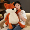 grosse peluche renard avec femme